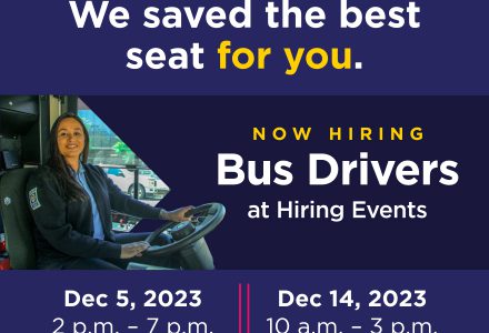 Photo of a bus driver in the driver seat. Text that says: we saved the best seat for you. Now hiring bus drivers at hiring events. Dec 5, 2023 2 p.m. to 7 p.m. Dec 14, 2023 10 a.m. to 3 p.m.