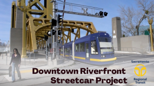 Rendering of streetcar on Tower Bridge. Text that says Downtown Riverfront Streetcar Project